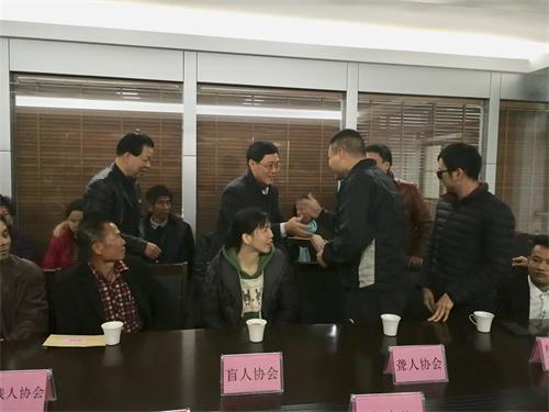 庄建儿常委参加揭阳市残联召开的残疾人专门协会和自强模范迎春座谈会(图1)